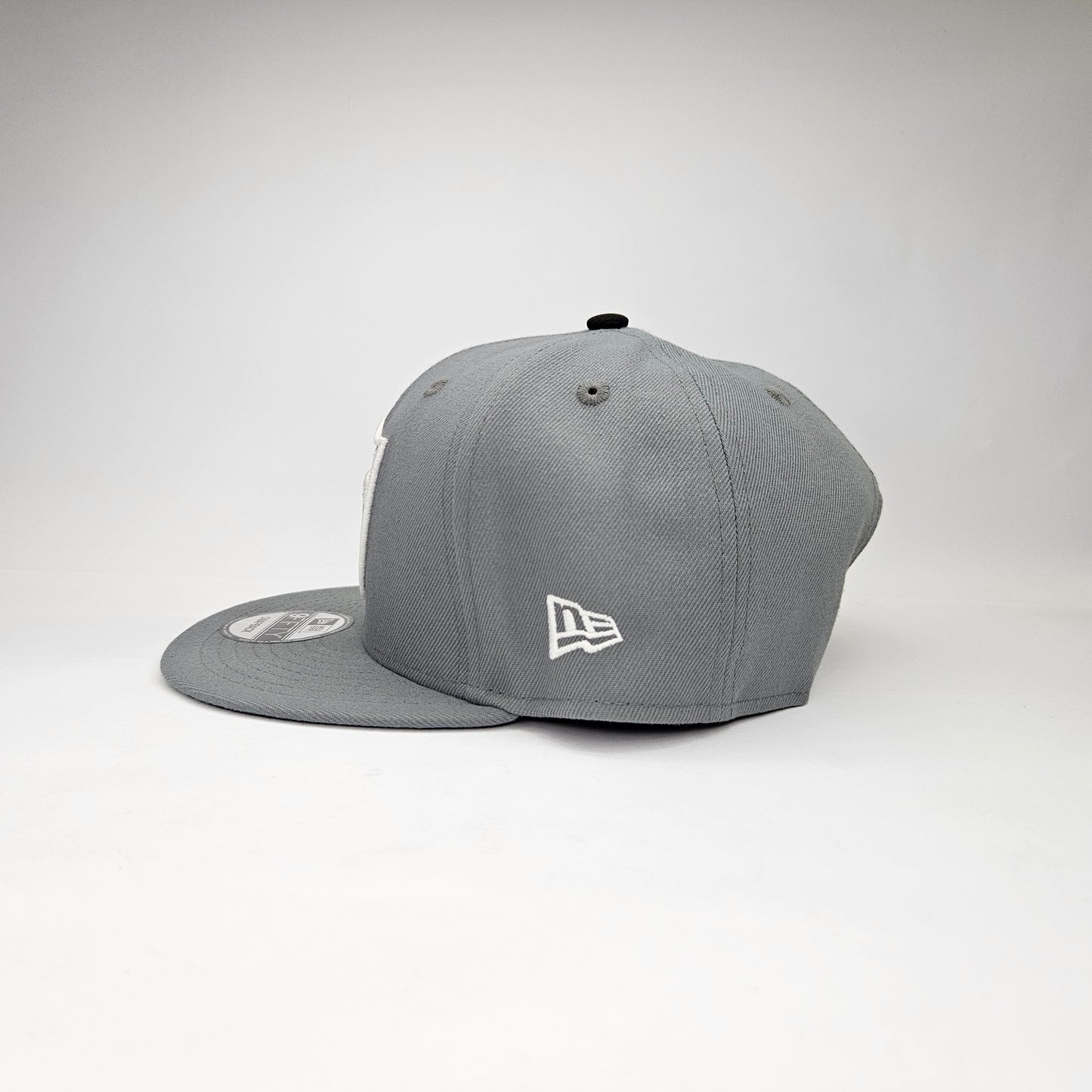 GORRA "NEW ERA" RAIDERS GRIS