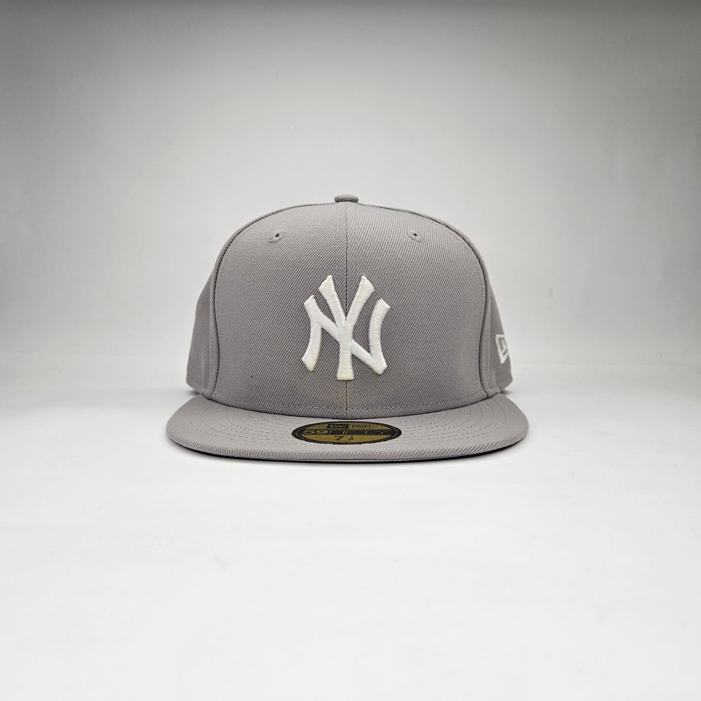 GORRA "NEW ERA" NY GRIS